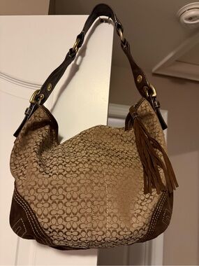 Coach Signature Canvas Shoulder Bag in Brown with Tassel
